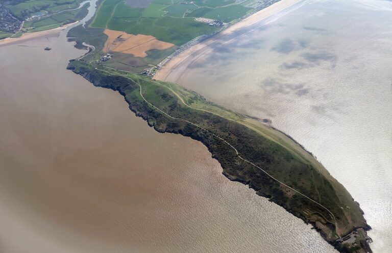 Aerial view of the Brean Down headland reaching into the Bristol Channel