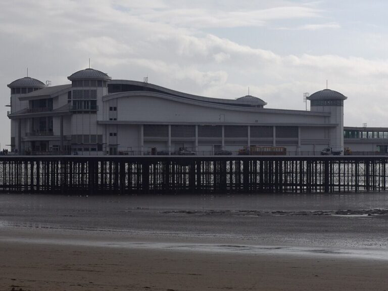 The Grand Pier at Weston-super-Mare seen from the beach at low tide