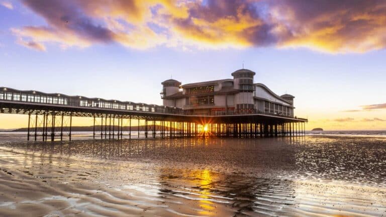 The Grand Pier at sunset on Weston-super-Mare beach