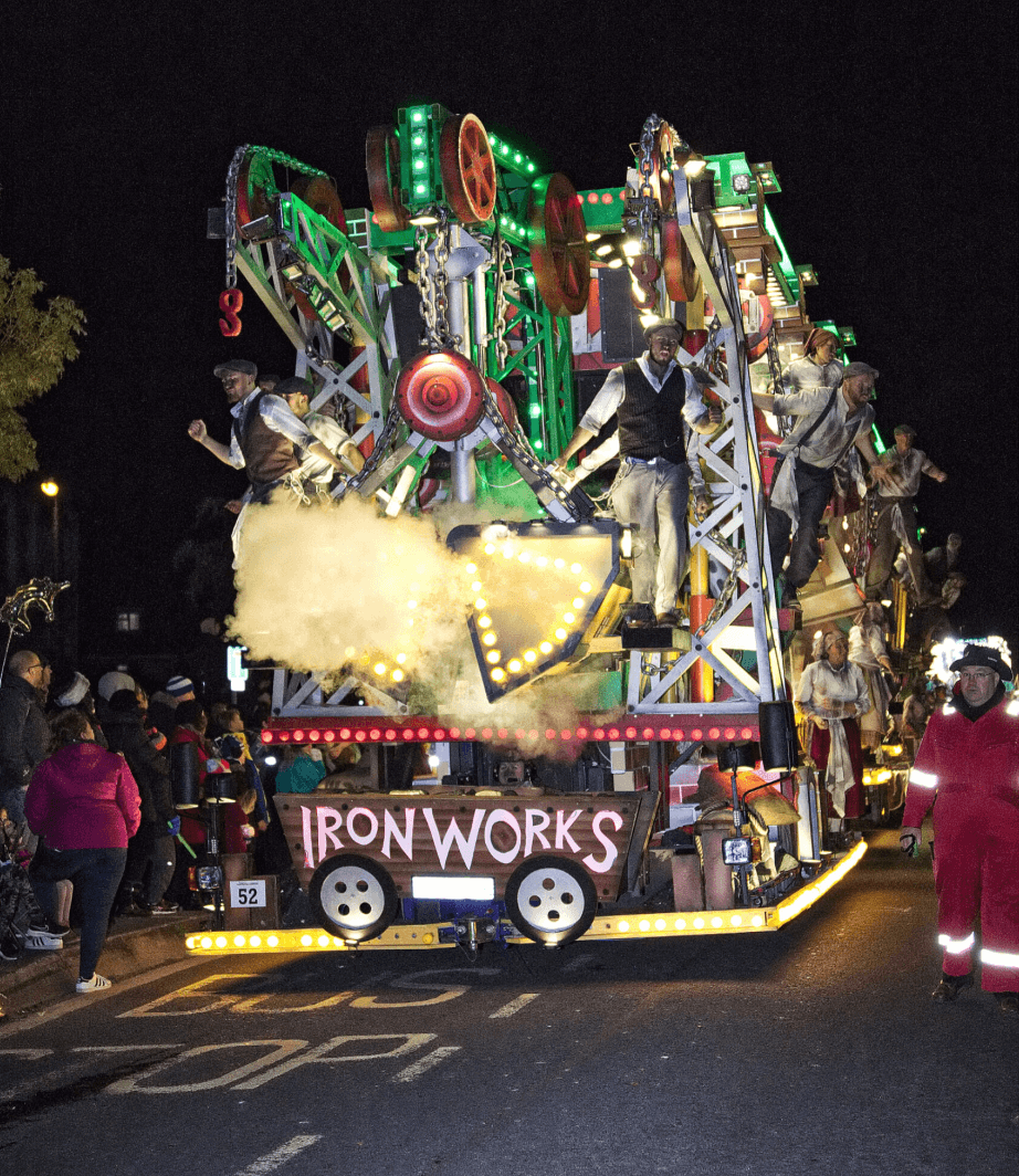 Iron Works carnival cart lit up at night, Weston-super-Mare Carnival