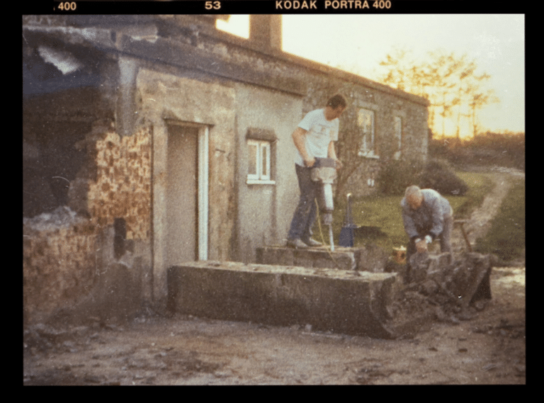 Kevin and Ken laying the first footing at Norton Court Farm in 1988