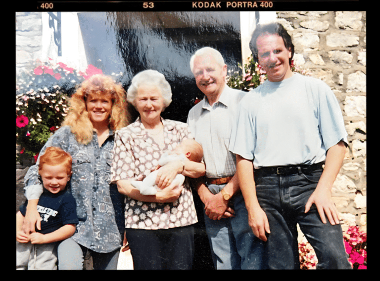 Our family story: three generations outside the farmhouse at Norton Court Farm in 1994